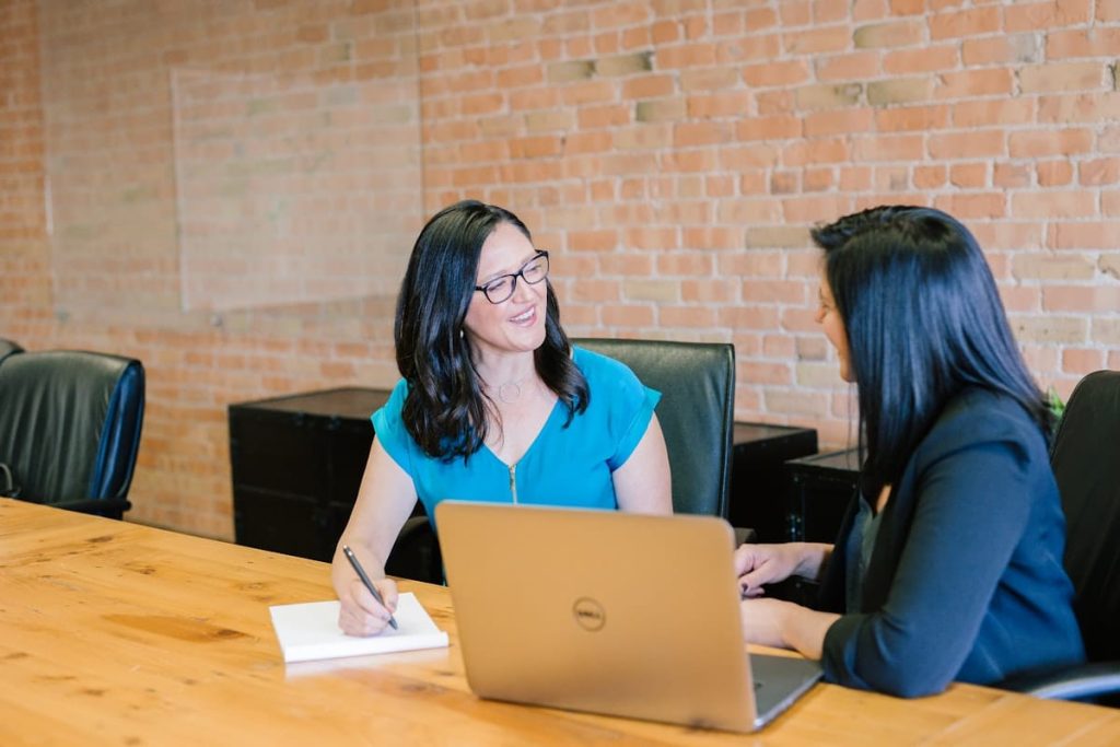 Agency team discussing digital marketing strategy during a client consultation meeting