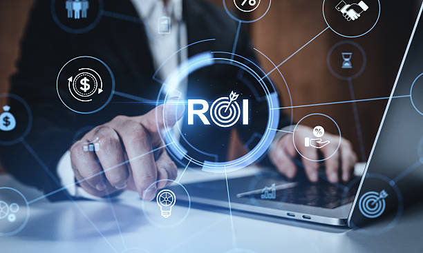 Business person using laptop with glowing ROI interface in digital style on soft background, concept of finance optimization and strategy